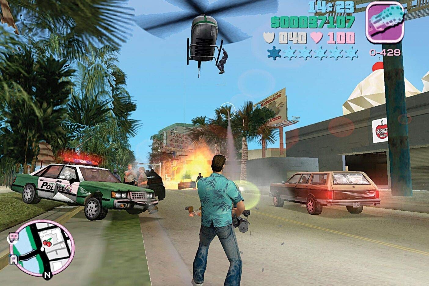 Vice City gameplay with helicopter, police car, and street combat
